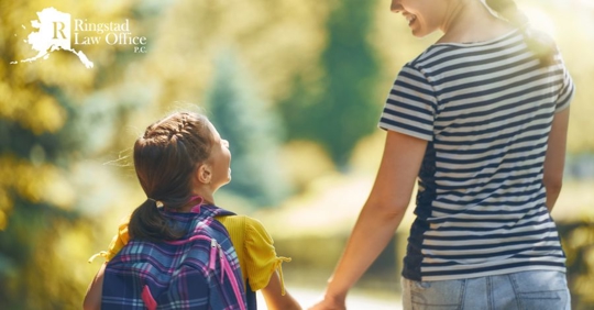 parent and child going to school